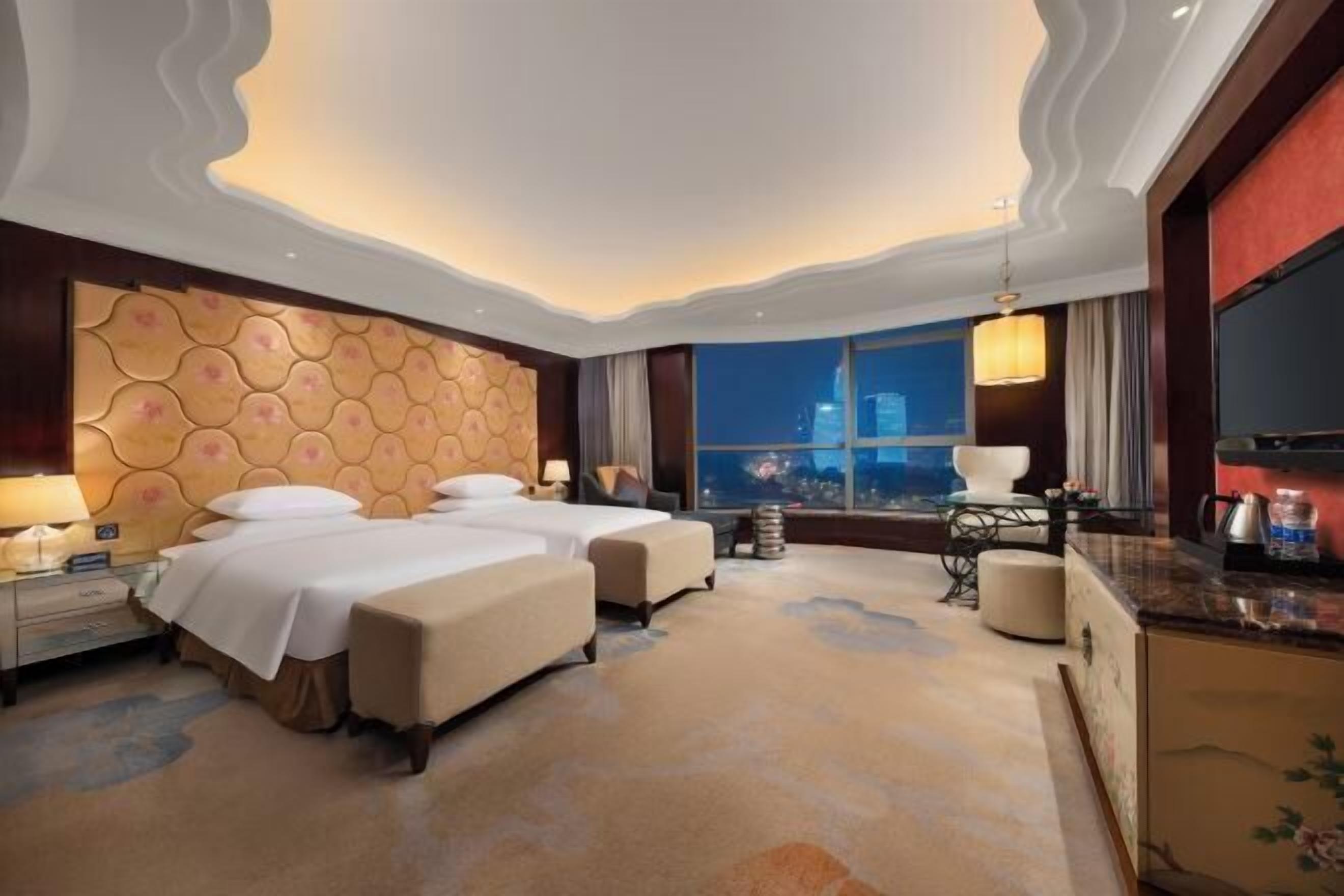 Premium bedding, down duvets, memory-foam beds, minibar