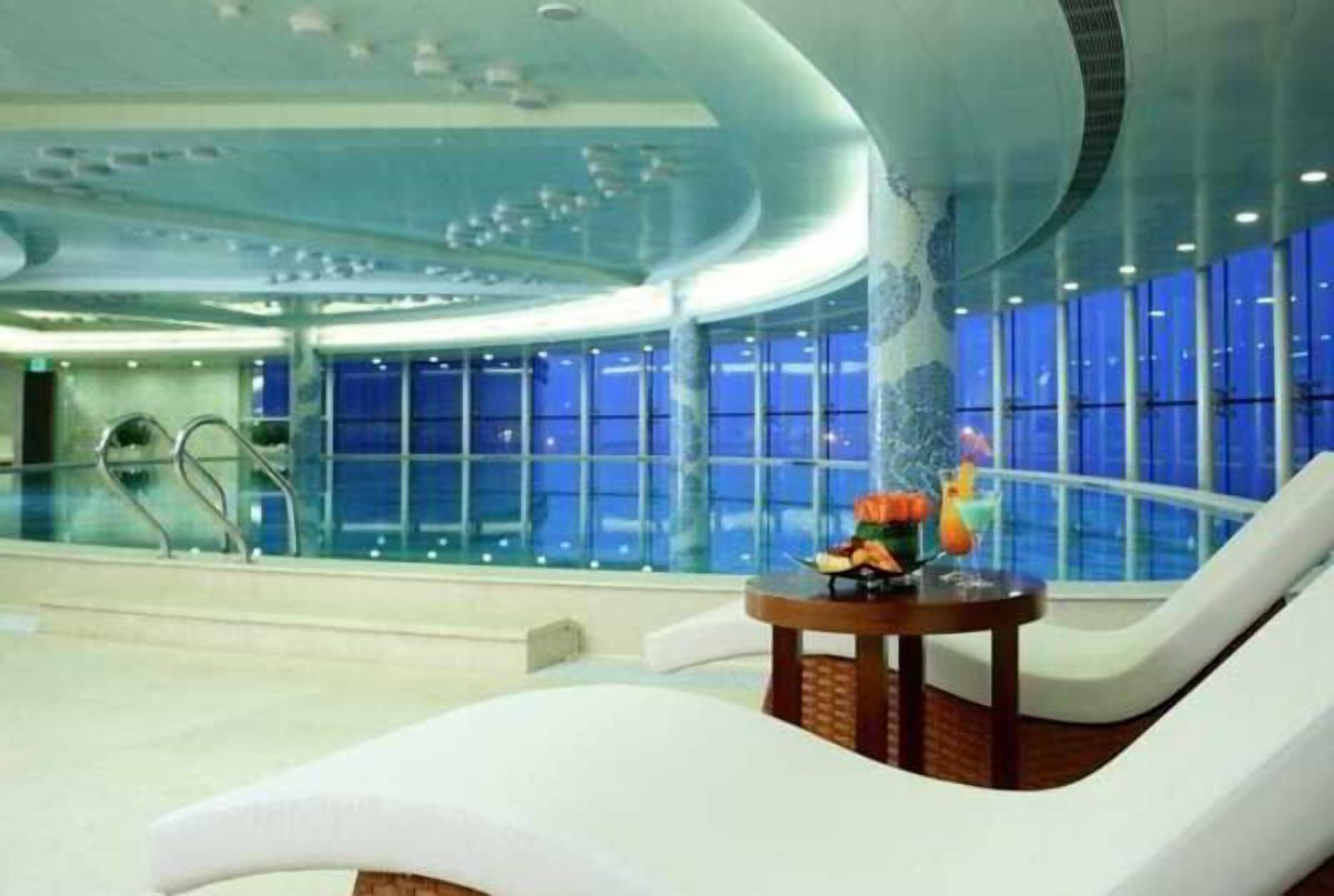 indoor pool, outdoor pool, pool loungers
