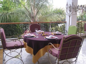Lunch, dinner served; Moroccan cuisine, garden views 