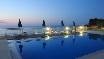 Outdoor pool, pool umbrellas, pool loungers