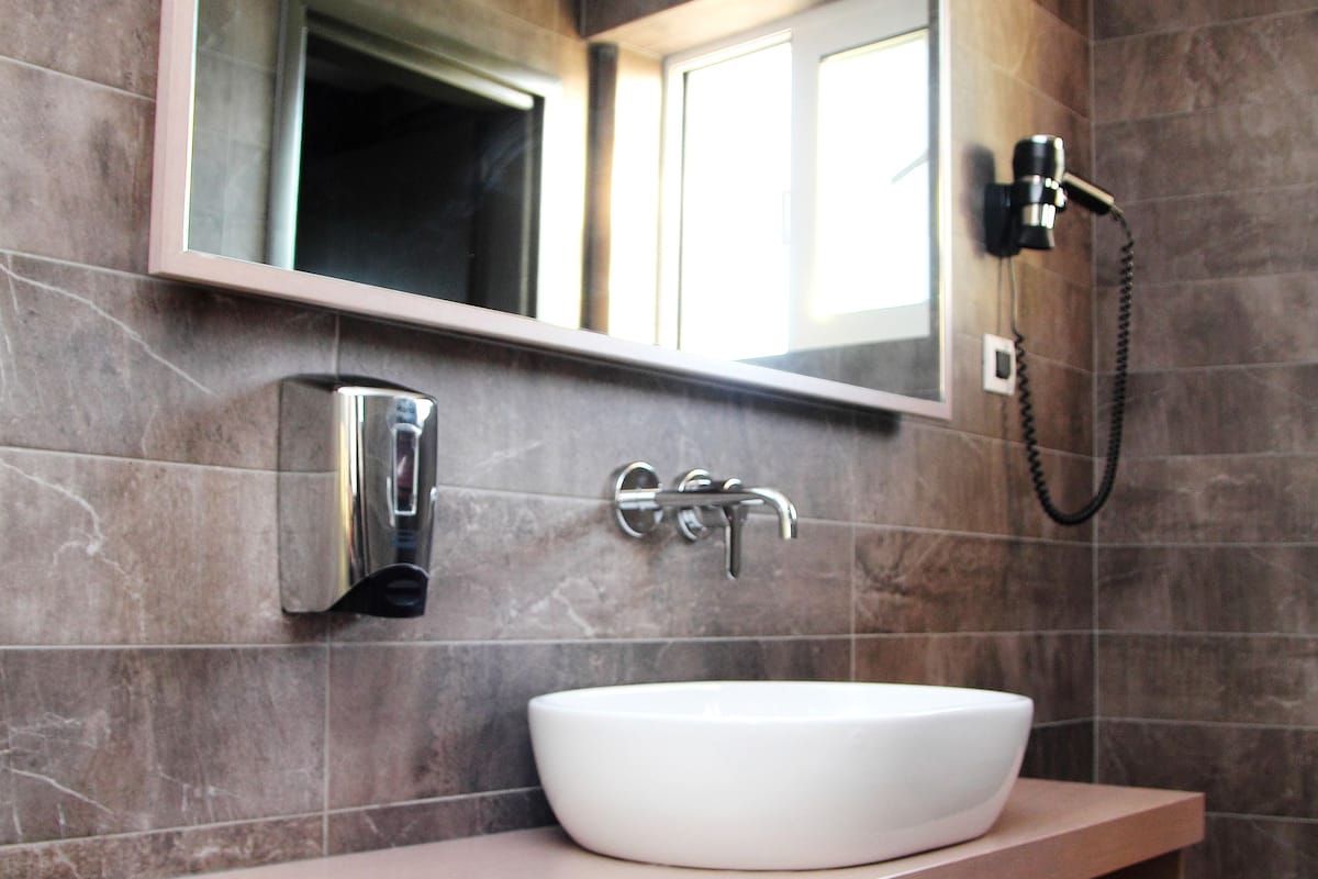 superior triple room, 1 bedroom, sea view | bathroom | shower, rainfall showerhead, free toiletries, hair dryer