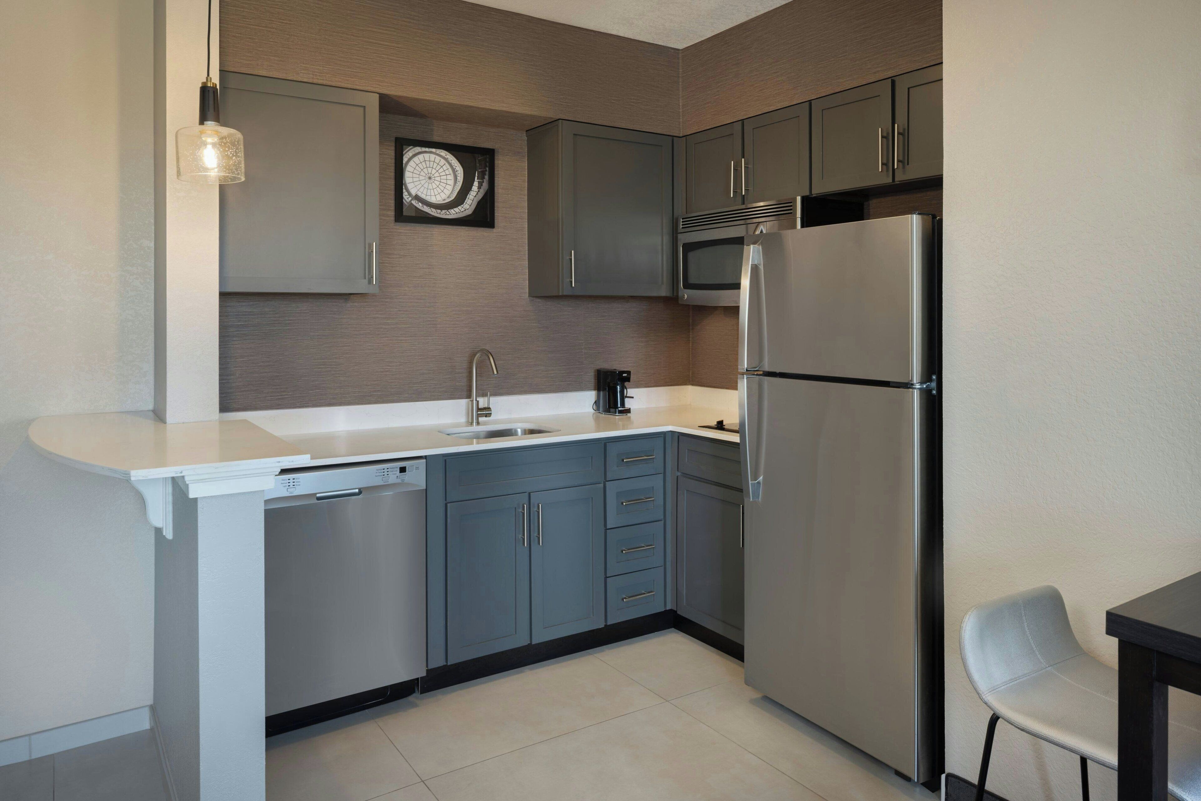 studio, 1 king bed with sofa bed | private kitchen | full-sized fridge, microwave, stovetop, dishwasher