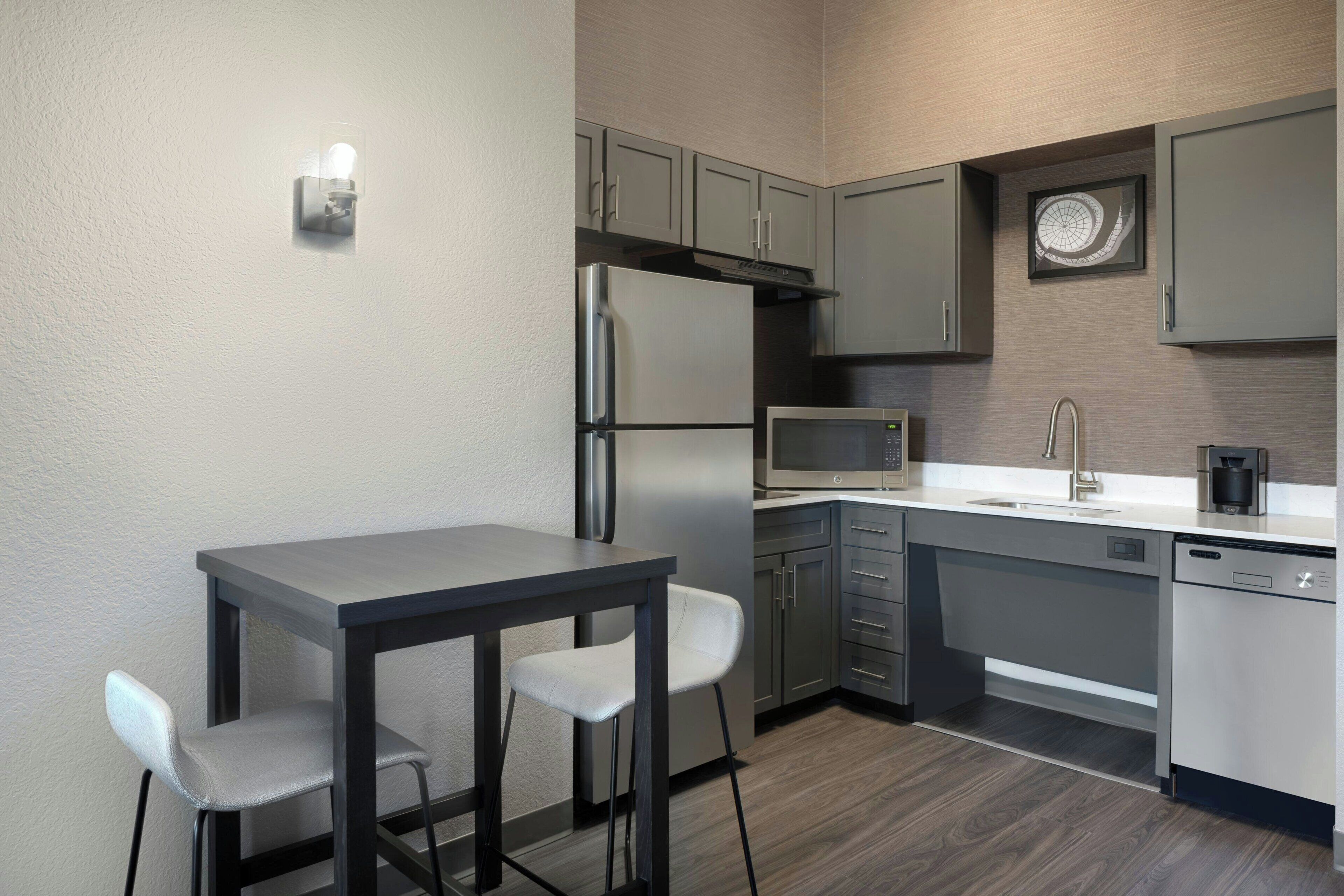 suite, 1 bedroom, smoking | private kitchen | full-sized fridge, microwave, stovetop, dishwasher