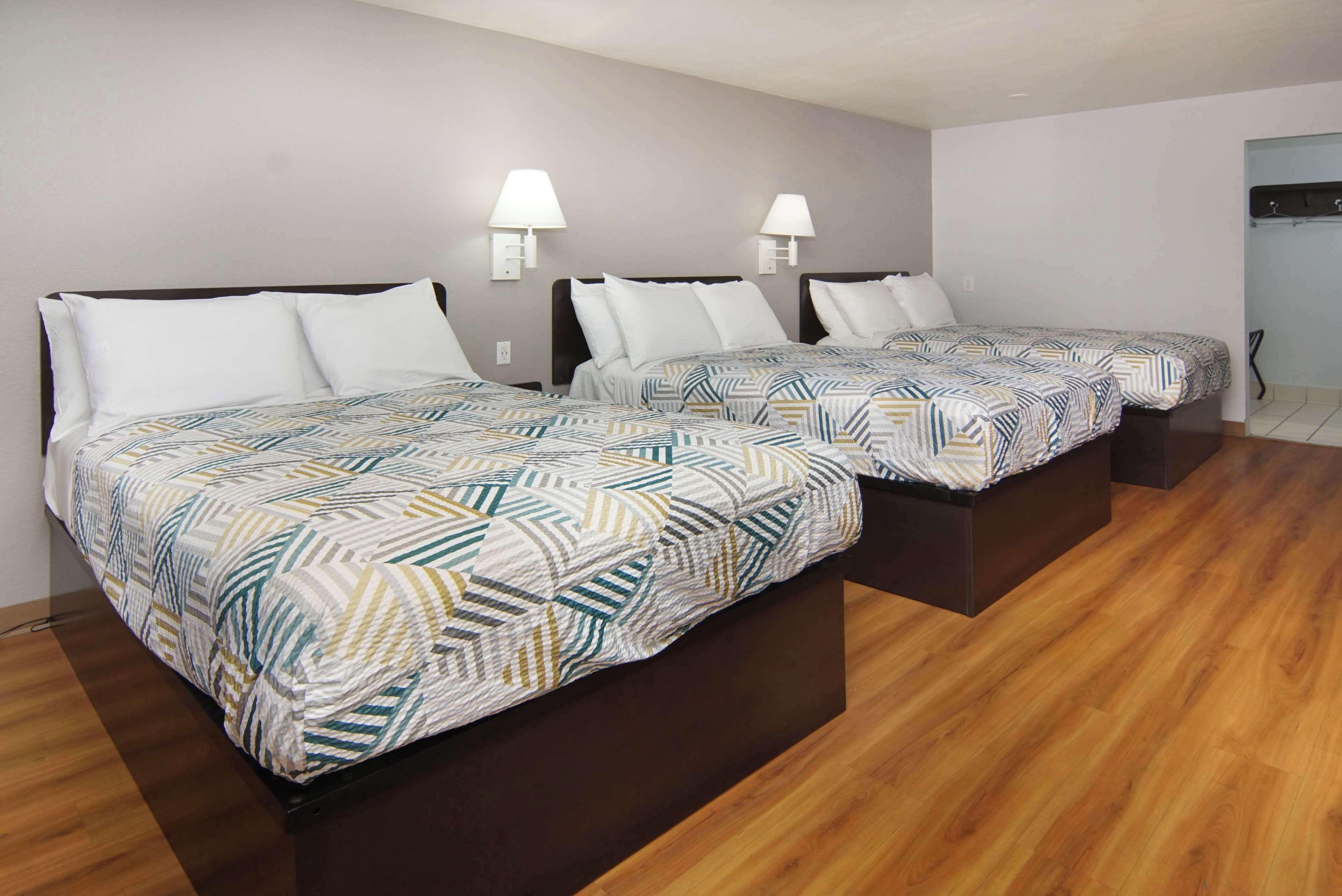 Standard Room, Multiple Beds, Non Smoking | Desk, free WiFi, bed sheets