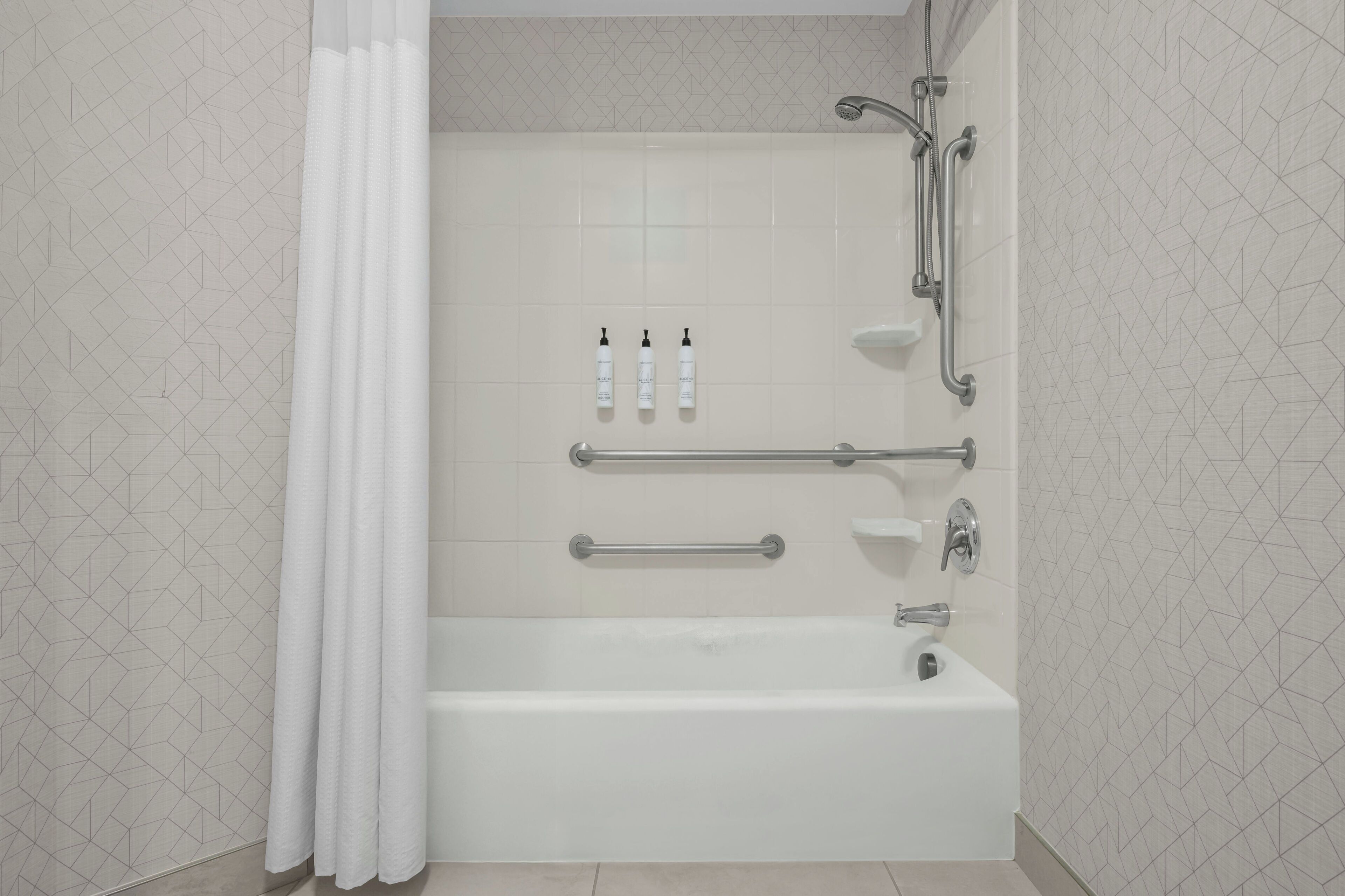 combined shower/bathtub, free toiletries, hair dryer, towels