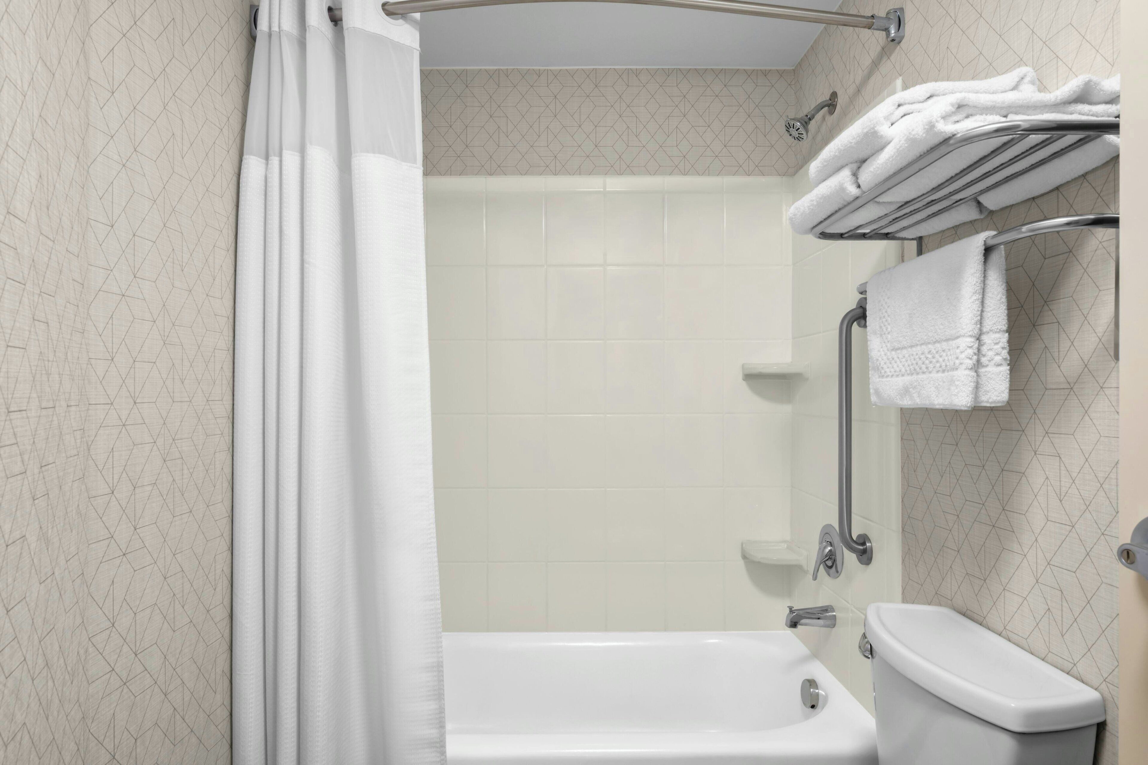 combined shower/bathtub, free toiletries, hair dryer, towels