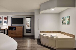 Deluxe kamer, 1 kingsize bed | Een bureau, een laptopwerkplek, verduisterende gordijnen