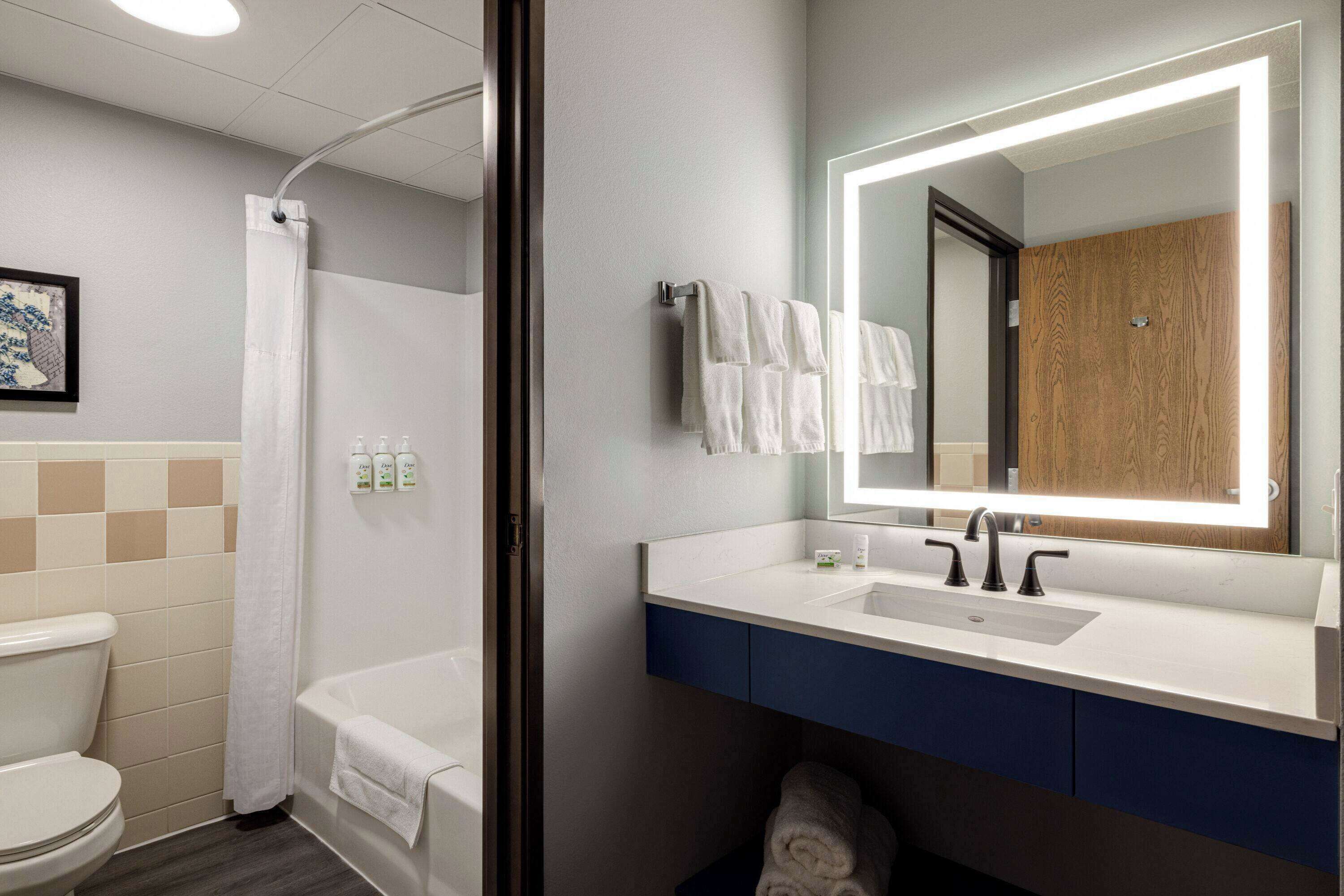 room, 2 queen beds | bathroom | combined shower/bathtub, hair dryer, towels
