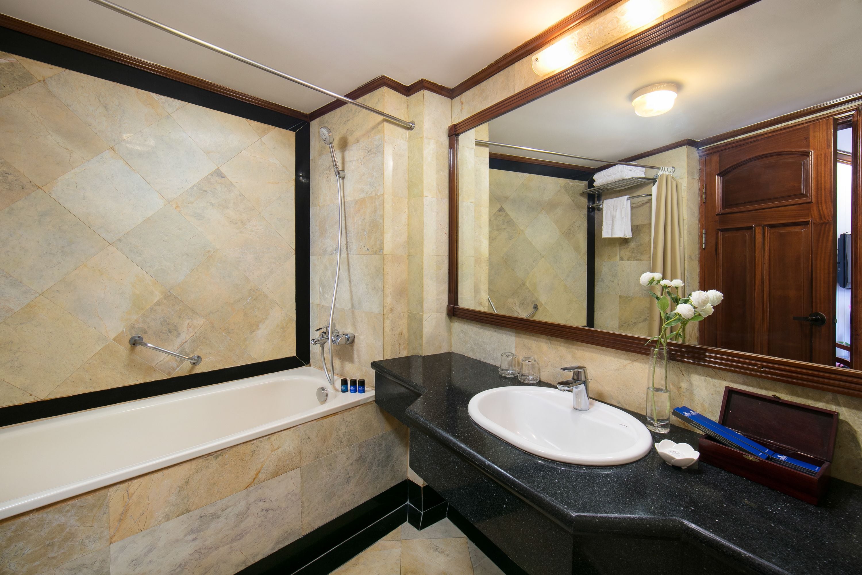 family connecting room, city view | bathroom | free toiletries, hair dryer, slippers, towels