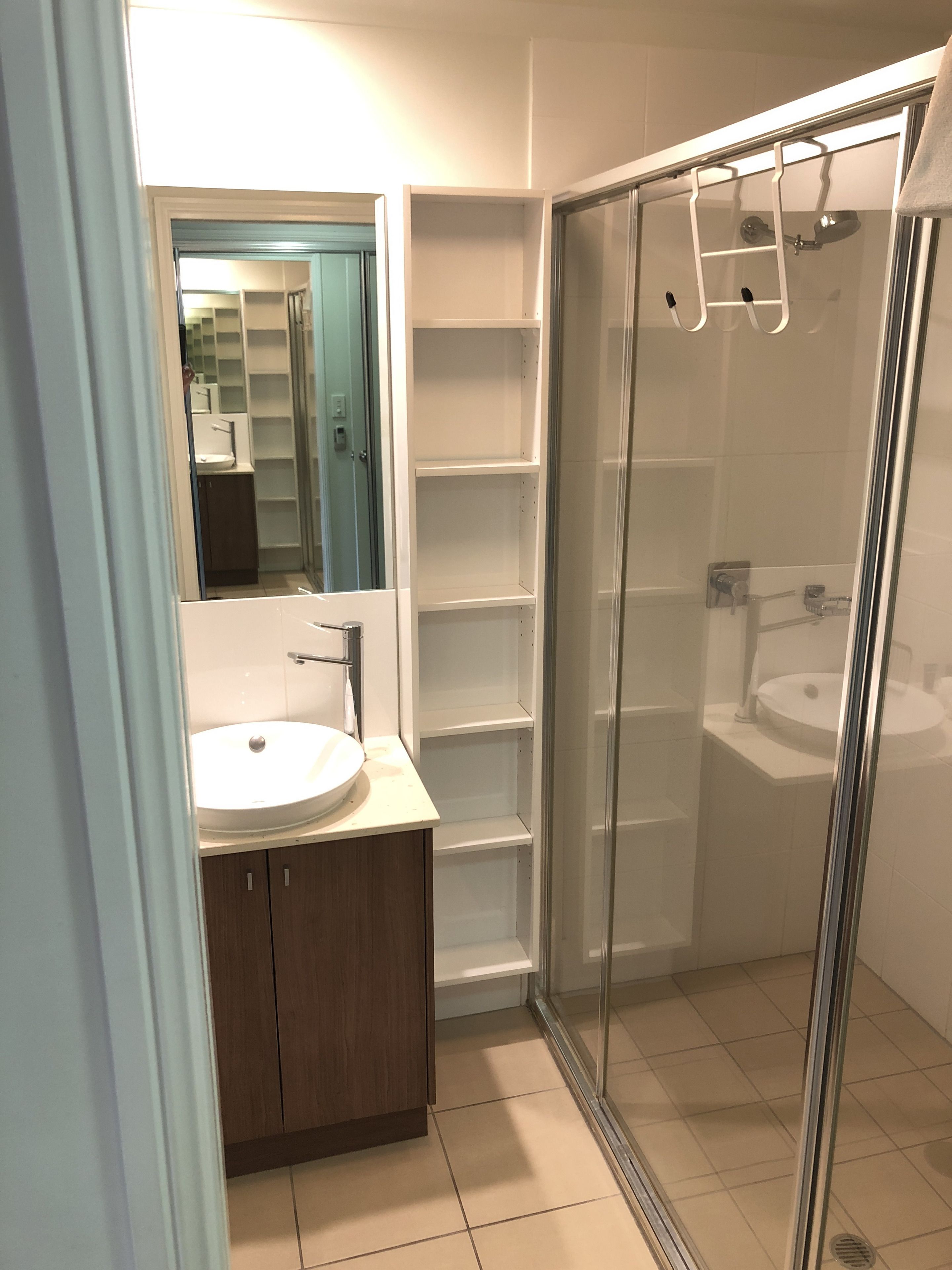 compact queen bed room | bathroom | shower, free toiletries, hair dryer, towels