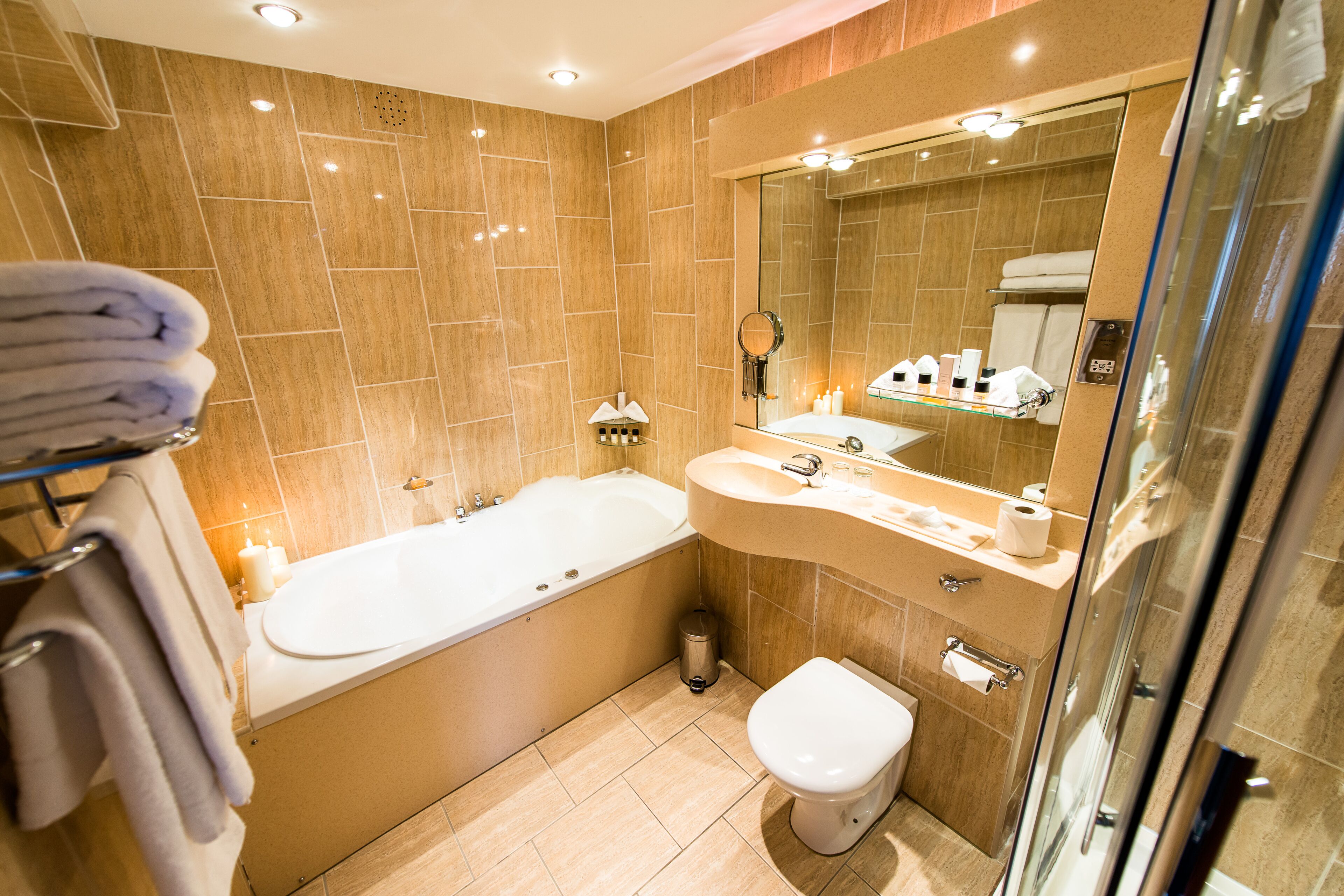 penthouse | bathroom | combined shower/bathtub, designer toiletries, hair dryer, towels