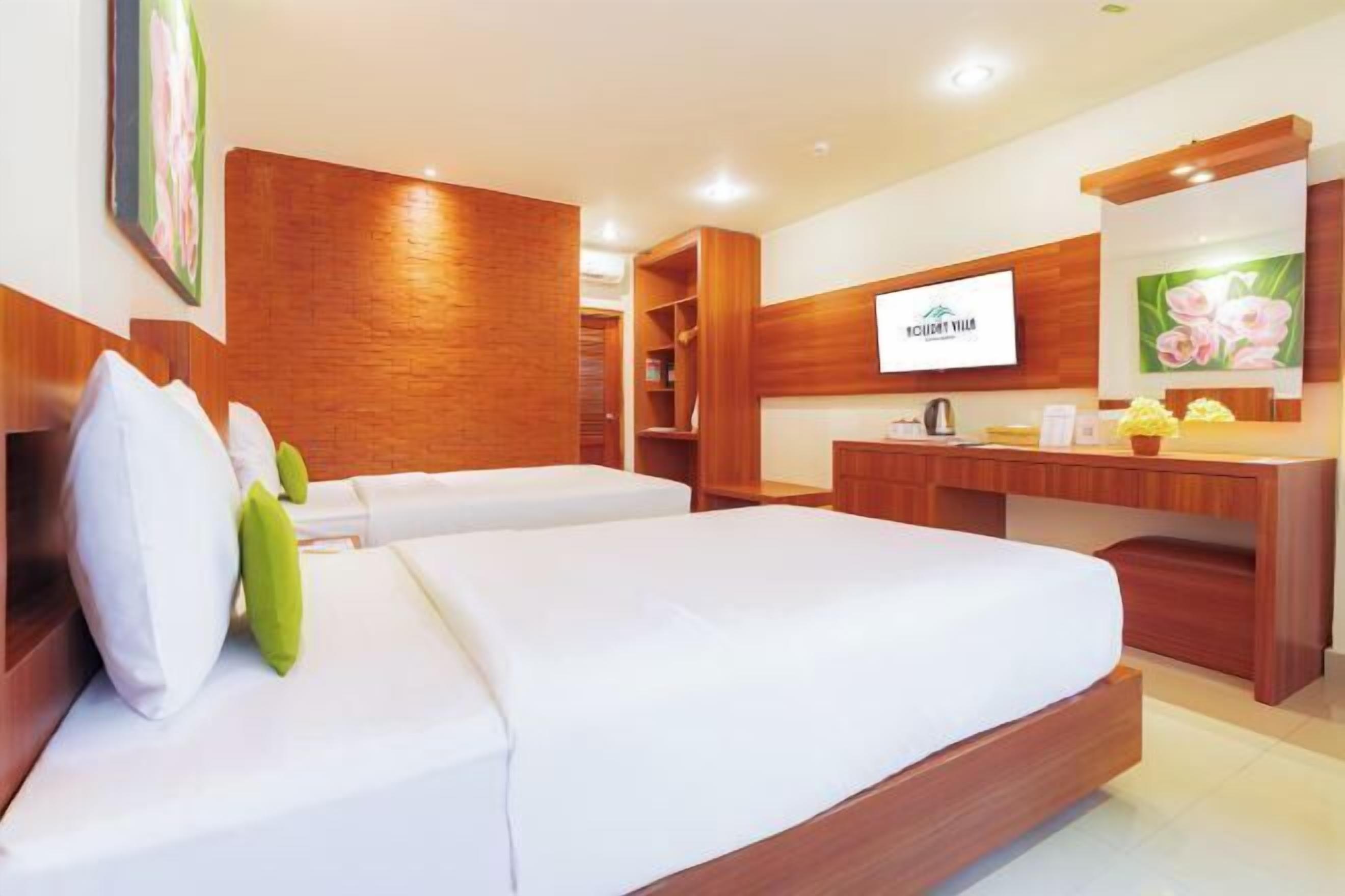 Bộ đồ giường cao cấp, minibar, két bảo mật tại phòng 