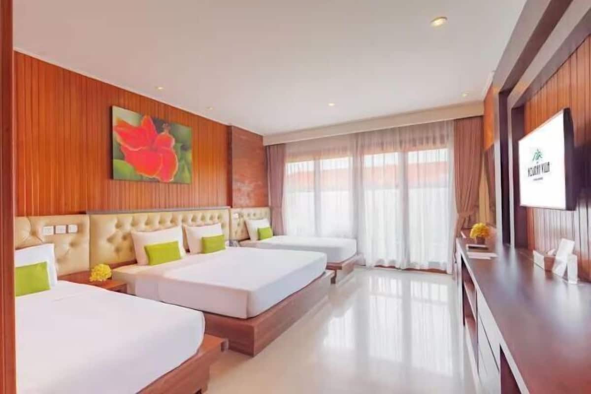 Luxe beddengoed, een minibar, een kluis op de kamer