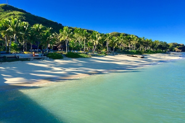 On the beach, beach towels, snorkeling, beach volleyball