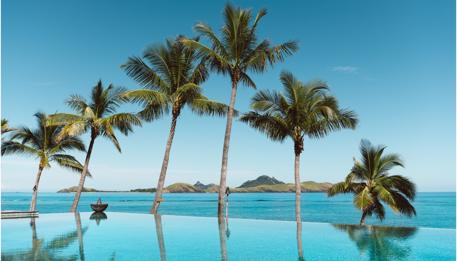 2 outdoor pools, pool umbrellas, sun loungers