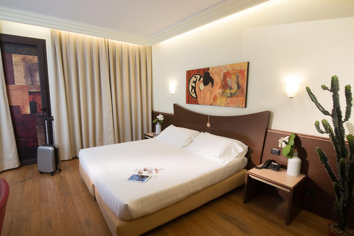 Couette en duvet d'oie, minibar, coffres-forts dans les chambres
