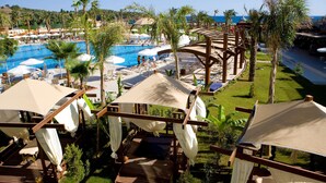 A resort with multiple swimming pools, shaded cabanas, and a well-maintained garden. - Saphir Resort & Spa (Alanya)
