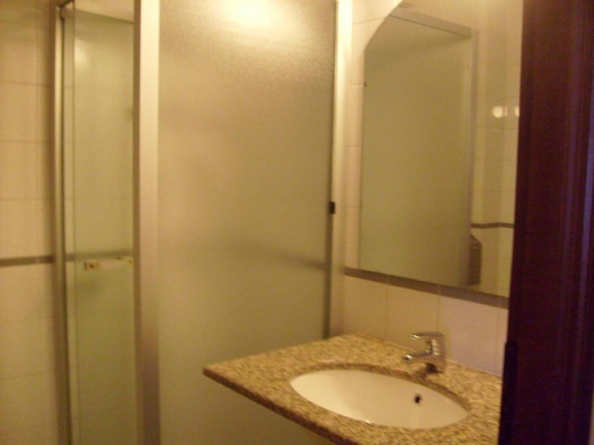 shower, hair dryer, slippers, bidet