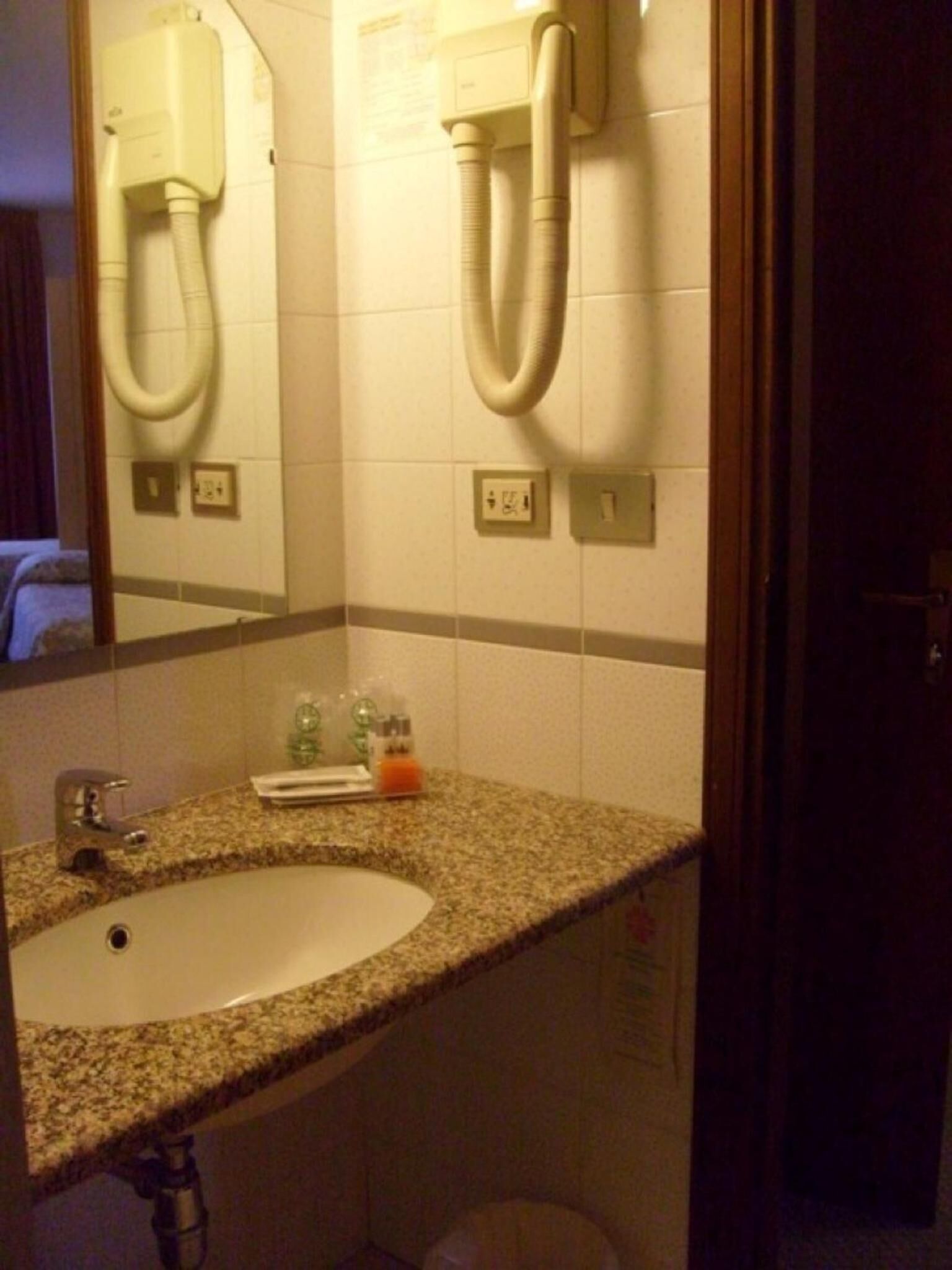 shower, hair dryer, slippers, bidet