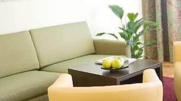 Deluxe Apartment | Living area | Flat-screen TV, offices