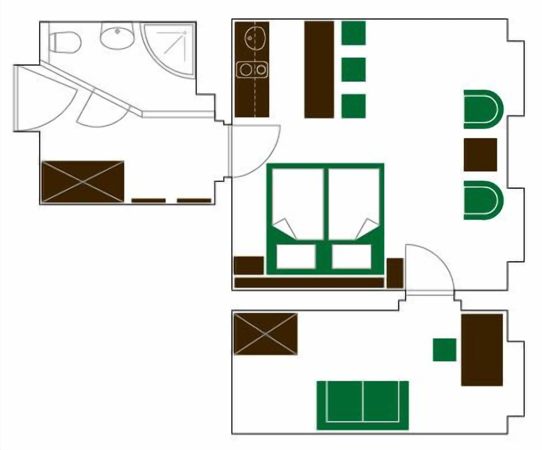 A floor plan with a kitchen, dining area, and a large living room with a fireplace.