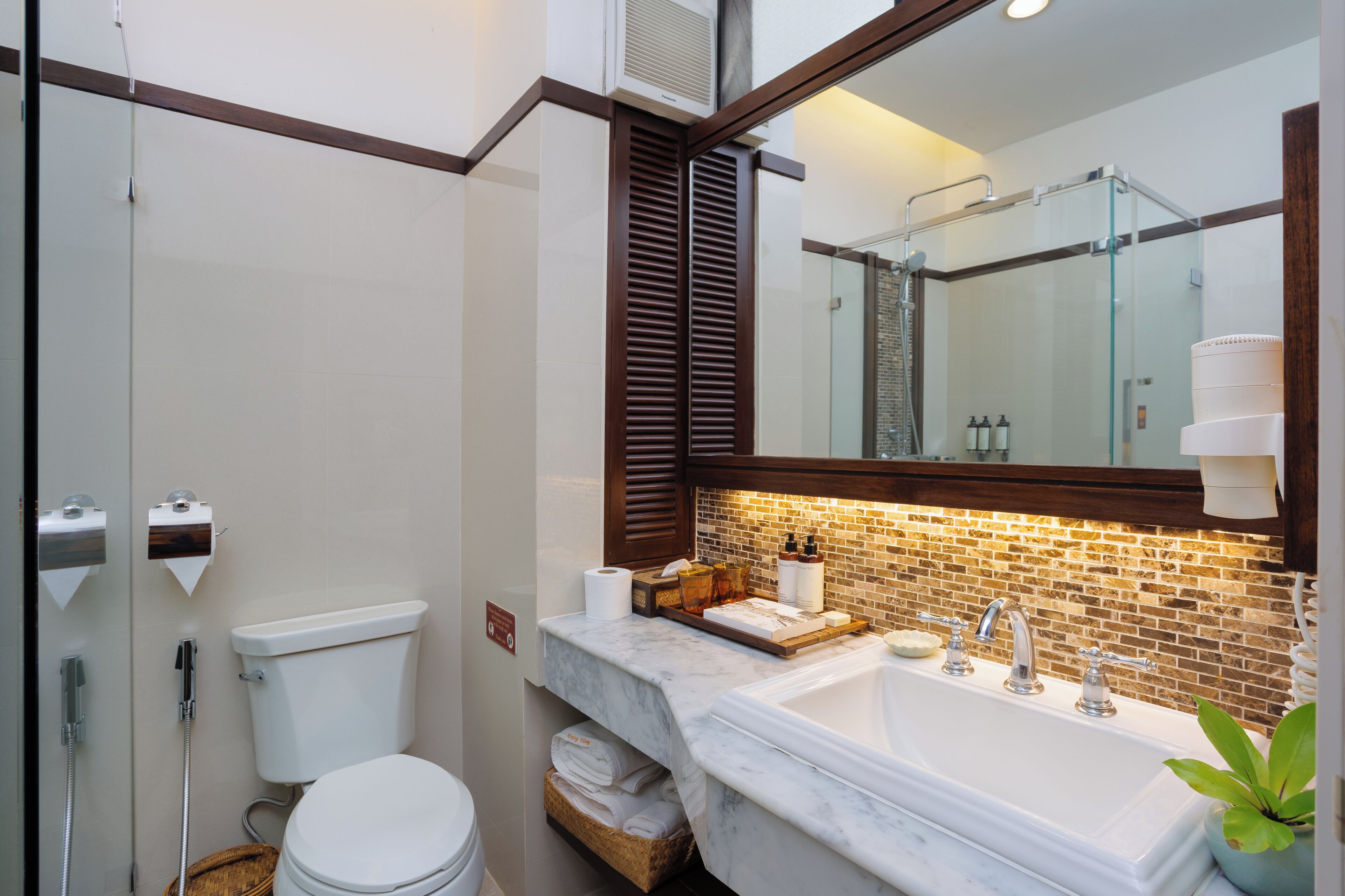 superior twin room | bathroom | designer toiletries, hair dryer, slippers, towels