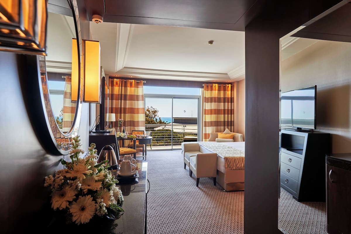 Frette Italian sheets, premium bedding, Tempur-Pedic beds, minibar