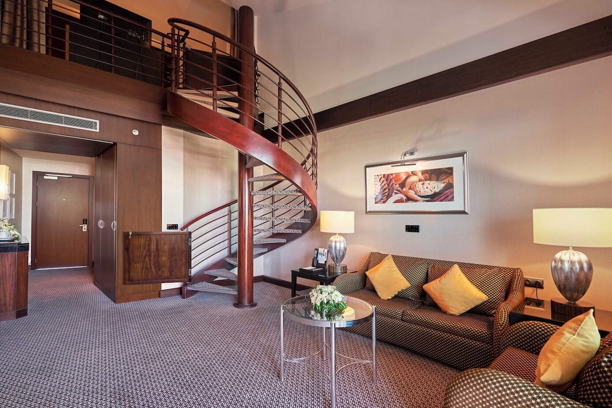 Frette Italian sheets, premium bedding, Tempur-Pedic beds, minibar