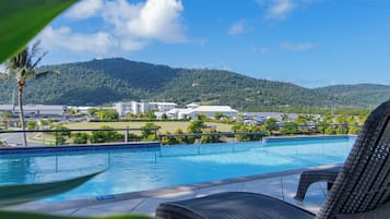 Outdoor pool, open 8:00 AM to 9:00 PM, pool umbrellas, sun loungers