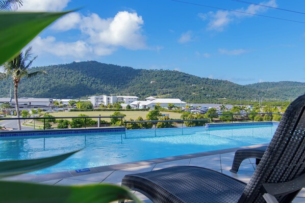 Outdoor pool, open 8:00 AM to 9:00 PM, pool umbrellas, sun loungers