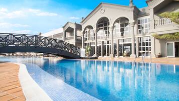 Outdoor pool, pool umbrellas, pool loungers