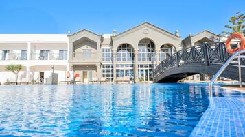 Outdoor pool, pool umbrellas, pool loungers