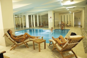 Indoor pool, outdoor pool, pool umbrellas, sun loungers