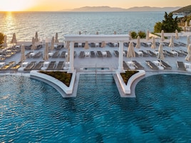Indoor pool, outdoor pool, pool umbrellas, sun loungers
