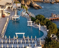 Indoor pool, outdoor pool, pool umbrellas, sun loungers
