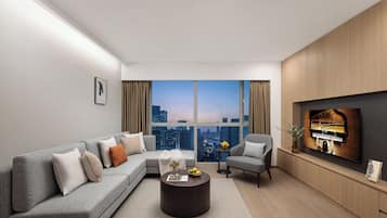 Departamento ejecutivo, 3 habitaciones | Sala de estar | Televisión LCD y reproductor de DVD