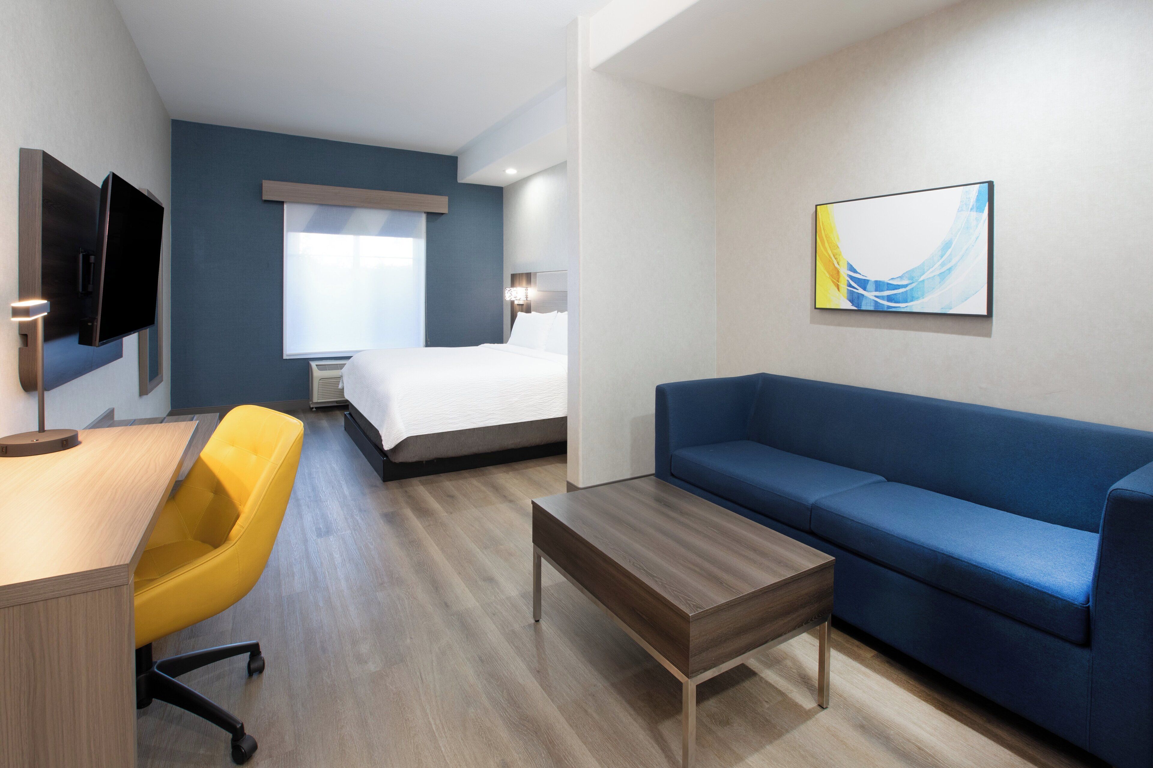 Suite, 1 King Bed with Sofa bed | In-room safe, desk, laptop workspace, iron/ironing board