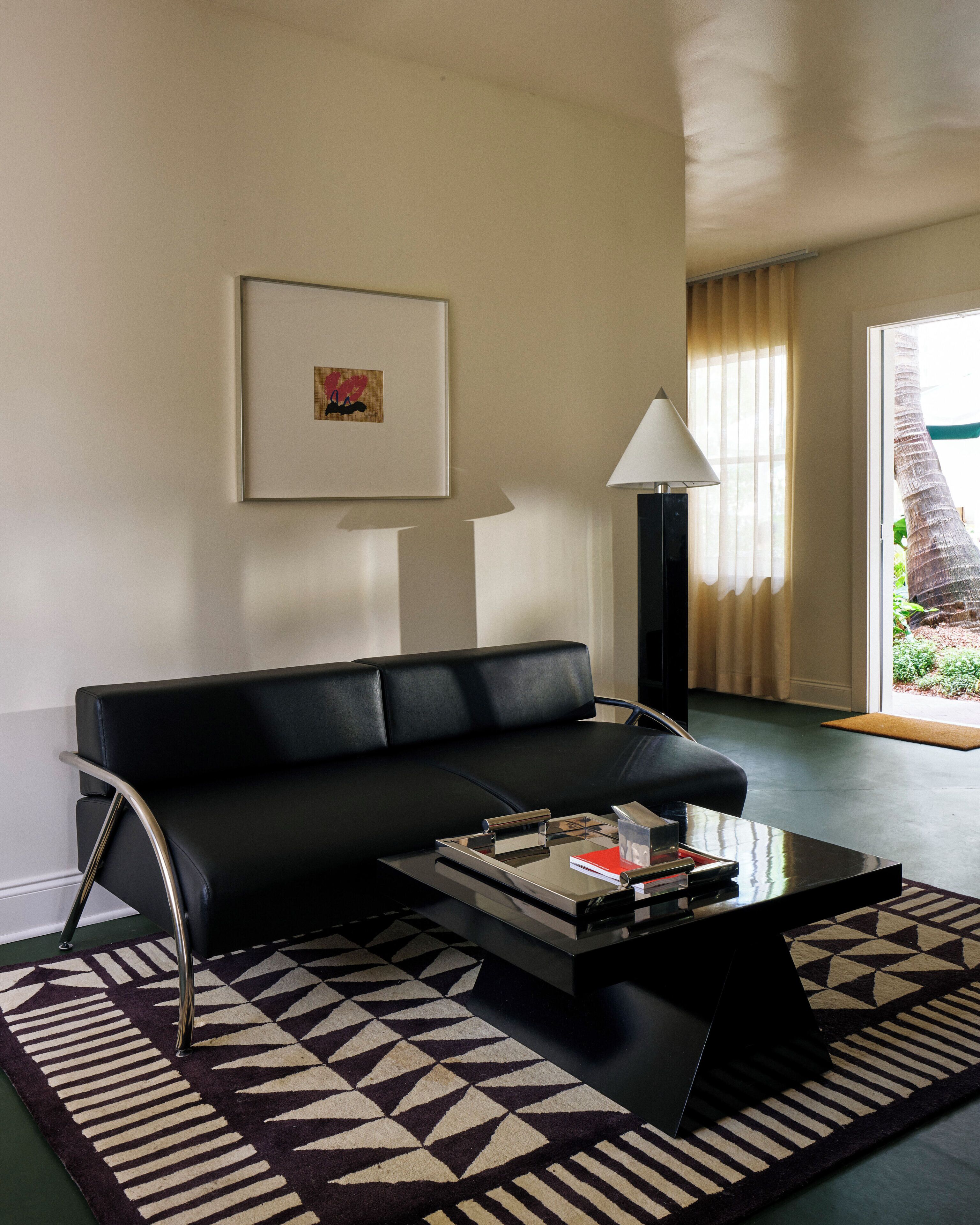Deluxe Room, 2 Queen Beds, Kitchenette | Living area | 40-inch flat-screen TV with cable channels, TV