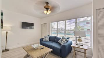 40-inch flat-screen TV with cable channels, TV