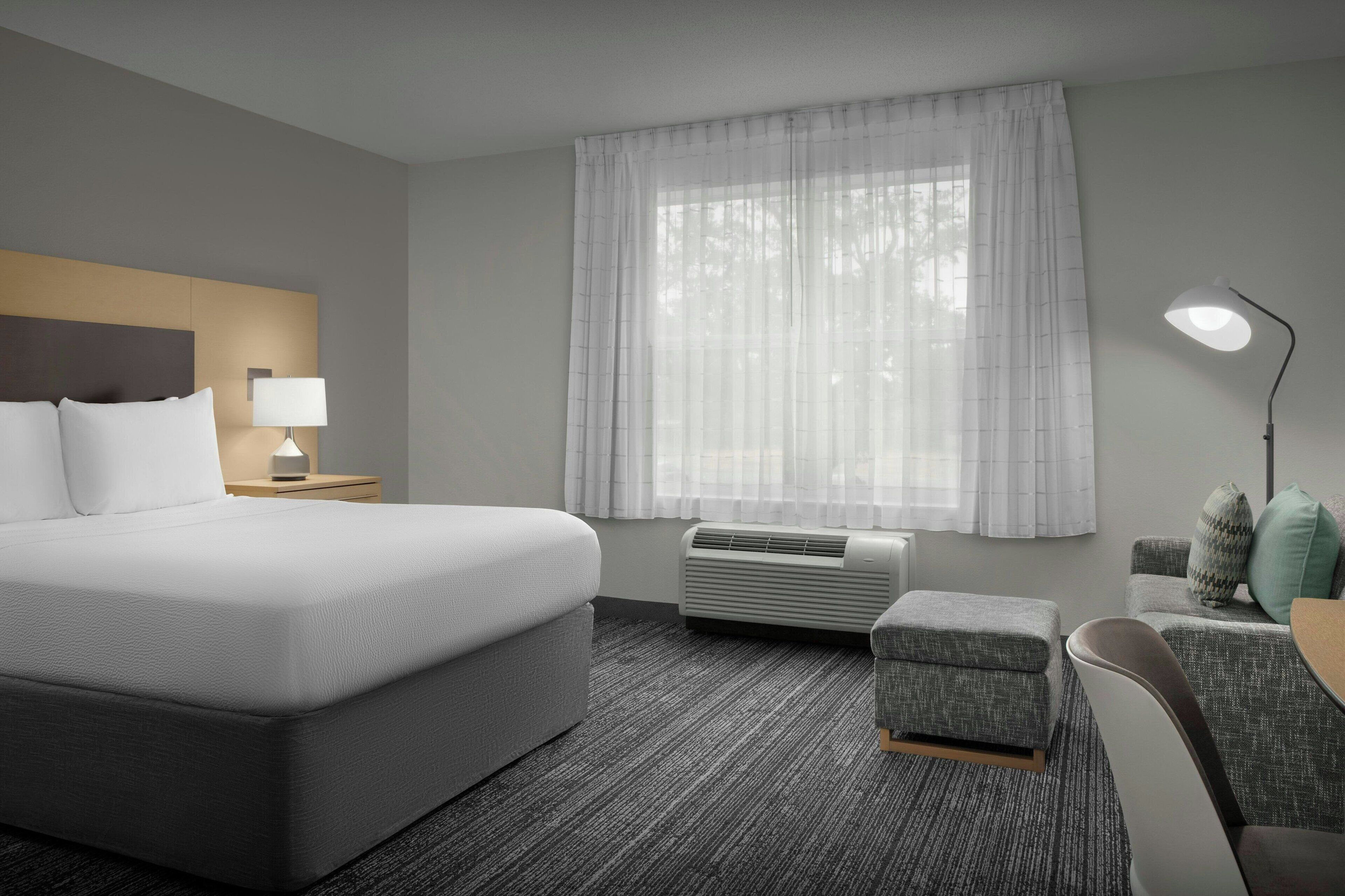 studio, 1 queen bed | premium bedding, desk, laptop workspace, blackout curtains