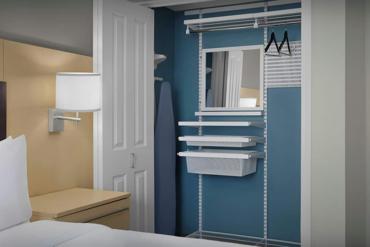 premium bedding, desk, laptop workspace, blackout curtains