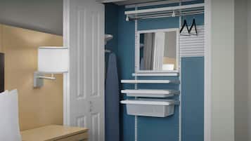 Premium bedding, desk, laptop workspace, blackout drapes