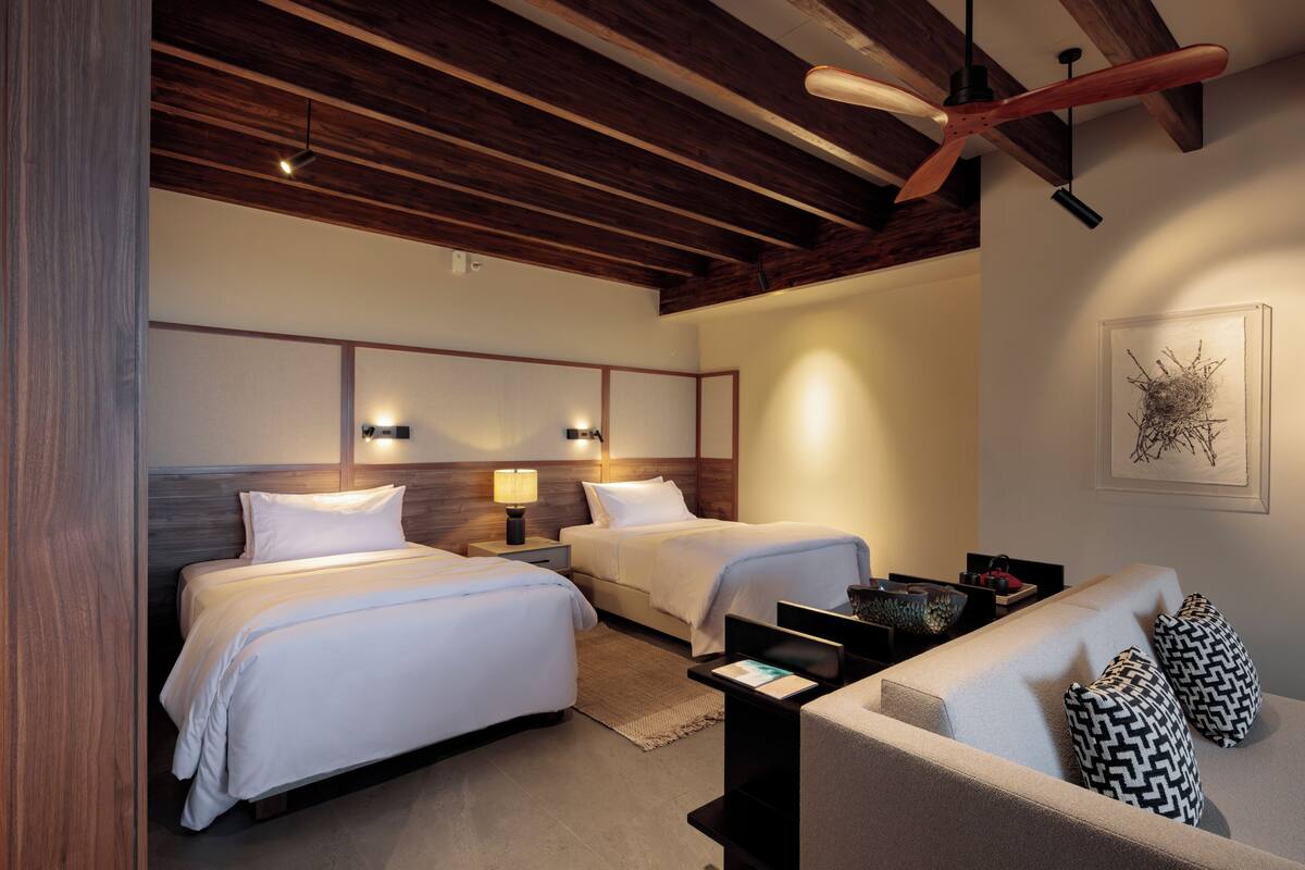 Habitación Deluxe con 1 cama doble o 2 individuales | Ropa de cama de alta calidad y colchones con acolchado adicional