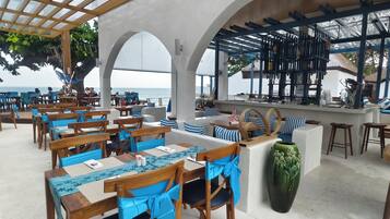 Breakfast, lunch, dinner served; beach views