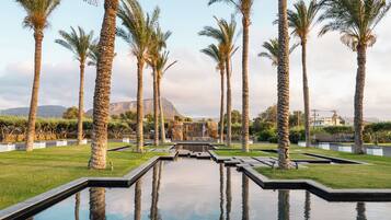 Indoor pool, pool umbrellas, pool loungers