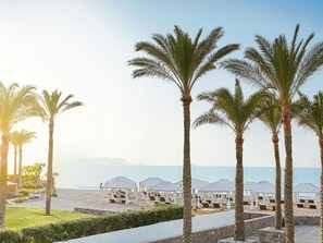 Private beach, sun loungers, beach umbrellas, beach towels
