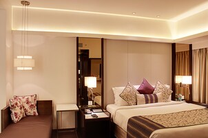 Pillow-top beds, minibar, in-room safe, desk