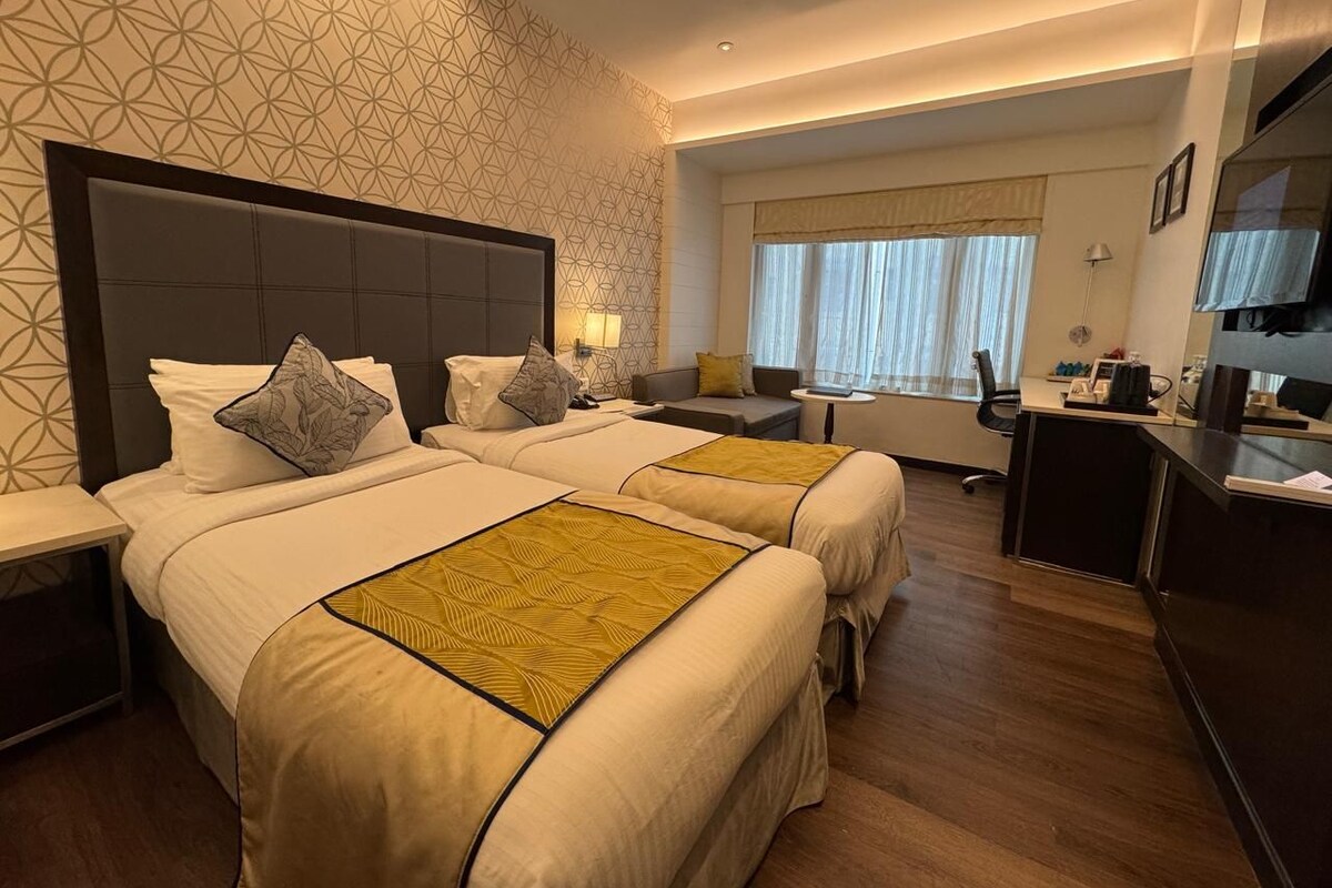 Surmatelas, minibar, coffres-forts dans les chambres, bureau