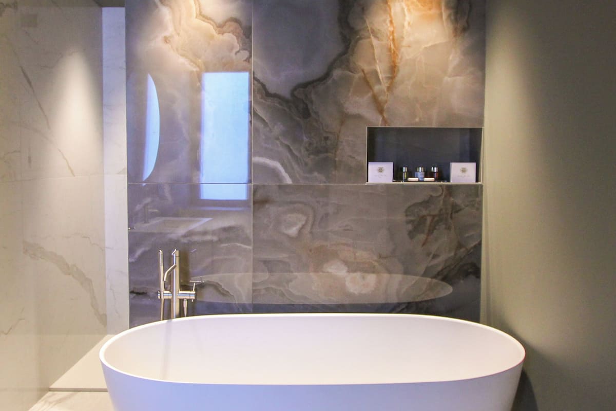 suite | bathroom | separate bathtub and shower, hair dryer, bathrobes, bidet