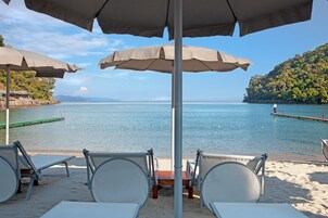 Praia particular, guarda-sóis 
